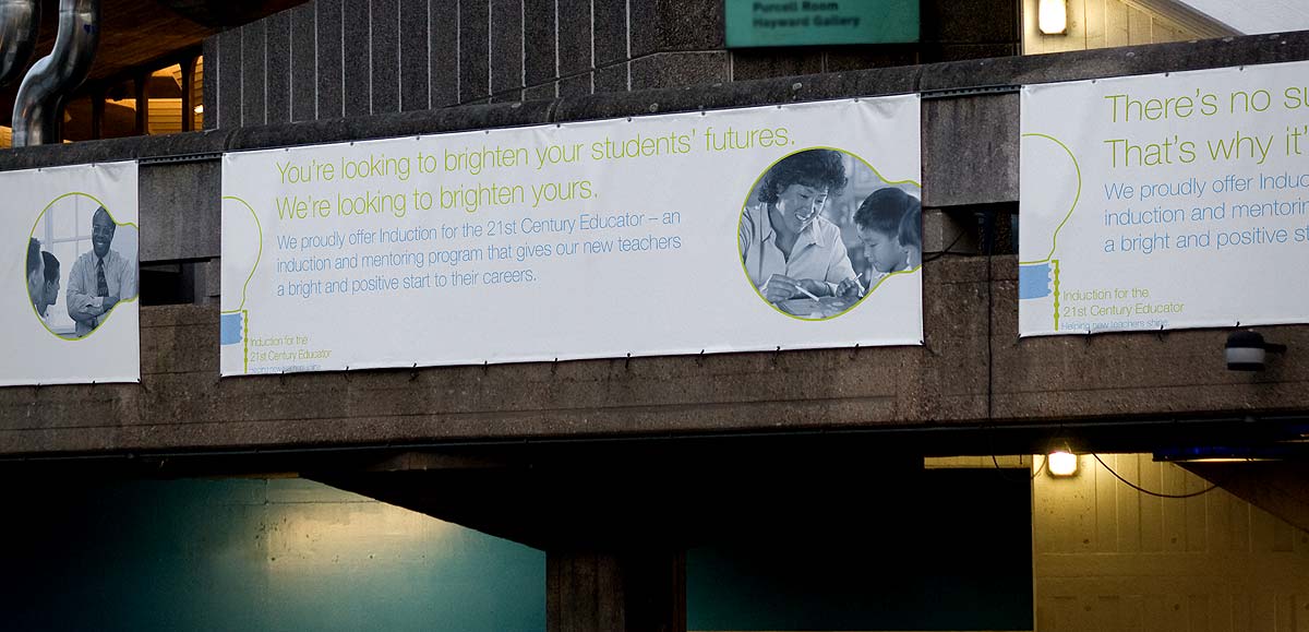 fpromotional banners hanging outside school facade